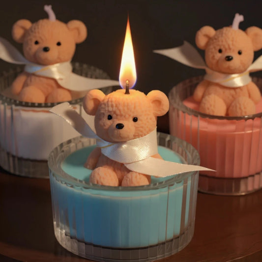 blue dragee bear candles in a cup